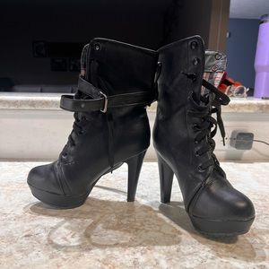 Black womens heeled boots. Size 6. Worn once.